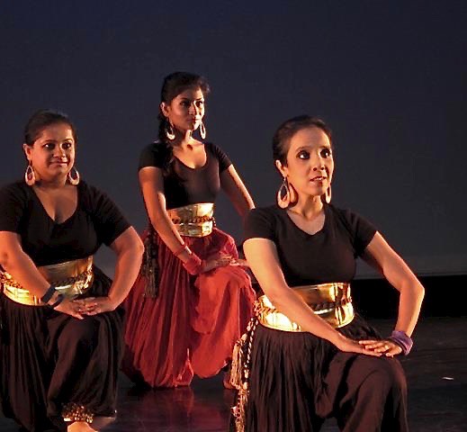 Photo of Diditi Mitra and other performers in Unsung Arrivals, a Courtyard Dancers production. Photo Credit-Anannya Dasgupta